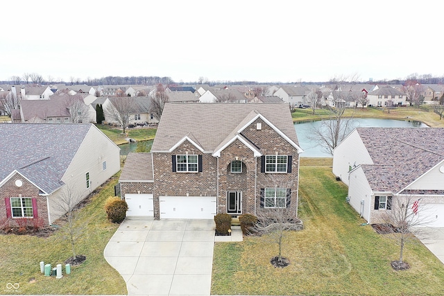 view of front of house featuring a water view and a front yard