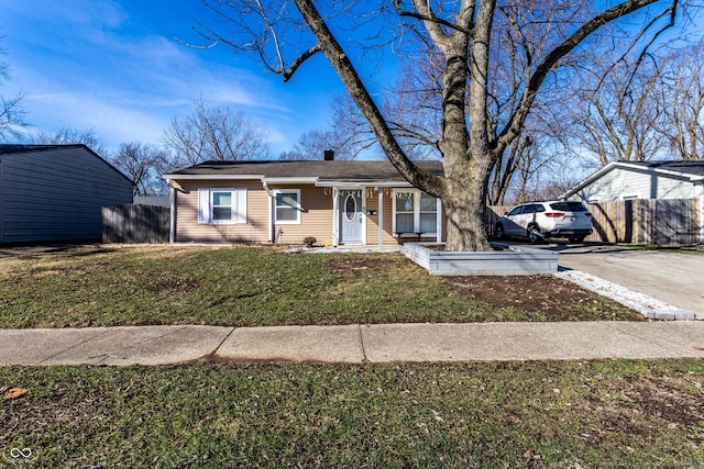 view of front of home featuring a front lawn