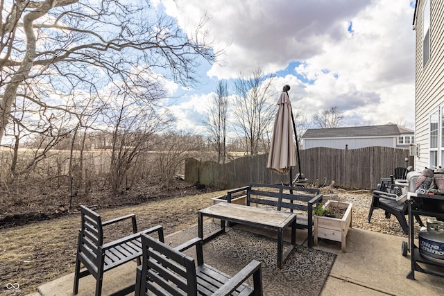 view of patio with fence