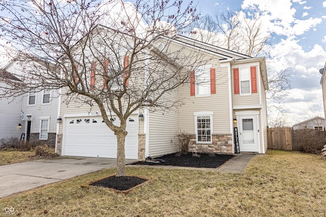 view of front of house with driveway, stone siding, fence, and a front yard