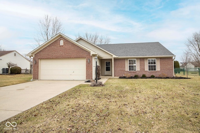 single story home featuring a garage, a front lawn, and central air condition unit