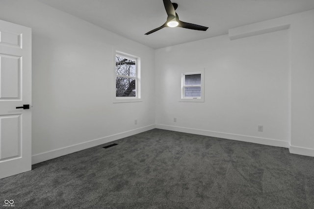 carpeted empty room with ceiling fan