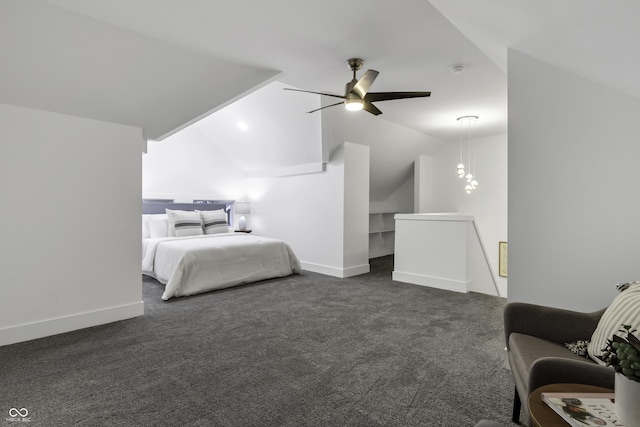 bedroom with ceiling fan, lofted ceiling, and dark colored carpet