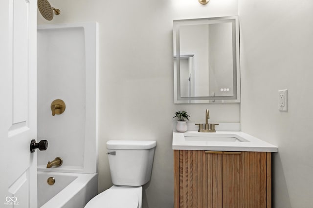 full bathroom featuring vanity, toilet, and shower / washtub combination