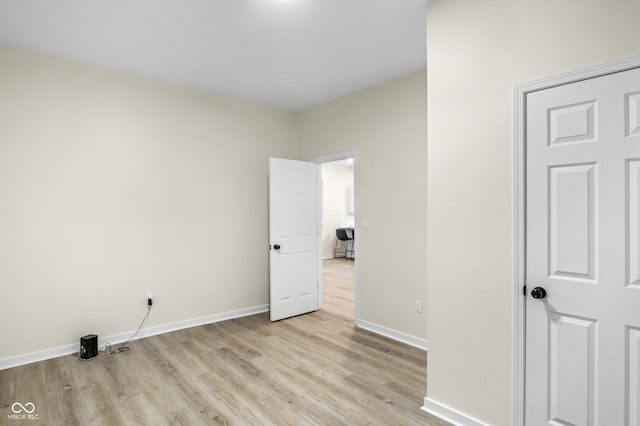 unfurnished bedroom featuring light hardwood / wood-style flooring