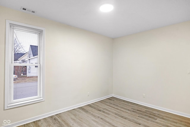 empty room featuring light hardwood / wood-style floors