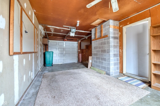 garage featuring a garage door opener