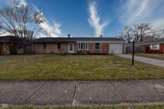 single story home with a garage and a front yard