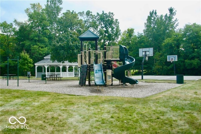 view of jungle gym with a lawn