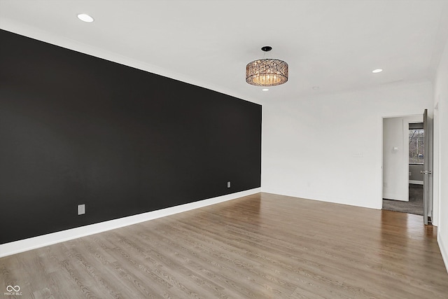 spare room with light wood-type flooring