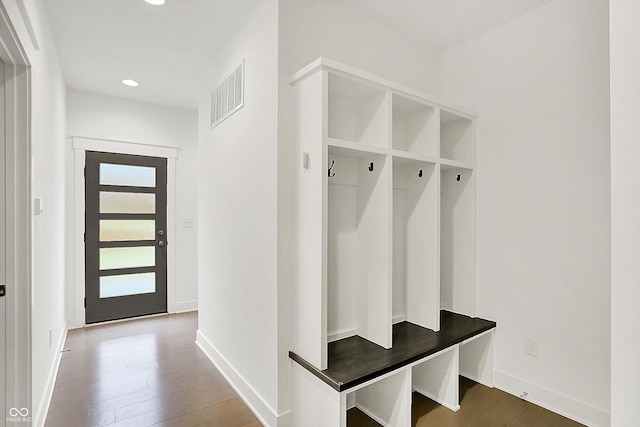 mudroom with hardwood / wood-style floors