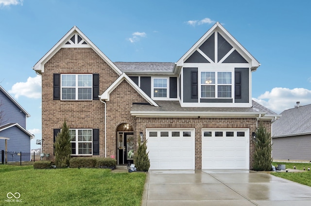 craftsman-style house with a garage and a front yard