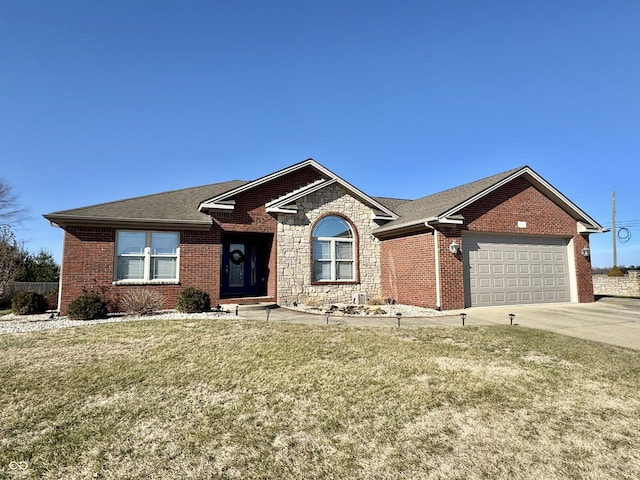 single story home featuring a garage and a front lawn