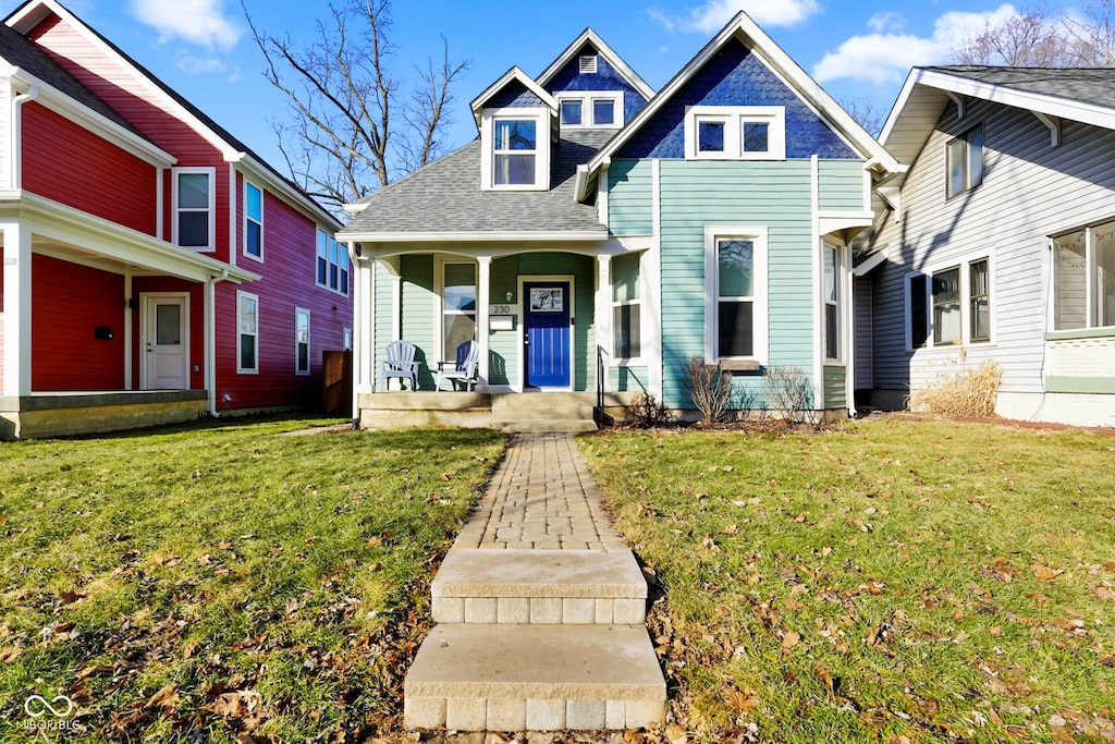 view of front facade featuring a porch and a front yard