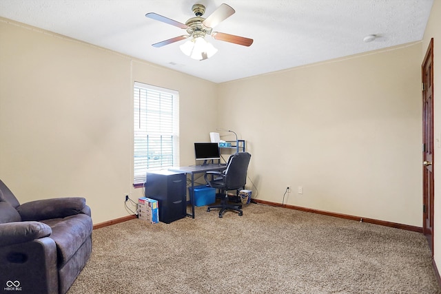 home office featuring carpet floors and ceiling fan