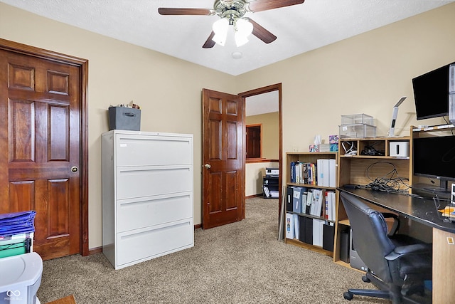 office area featuring ceiling fan and light colored carpet