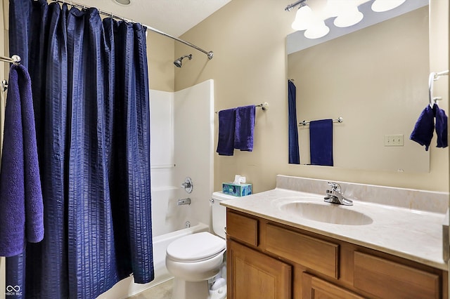 full bathroom featuring vanity, shower / bath combo with shower curtain, and toilet