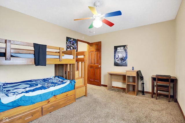 bedroom with ceiling fan and carpet