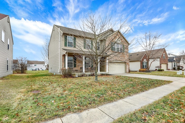 view of front of house featuring a garage and a front lawn