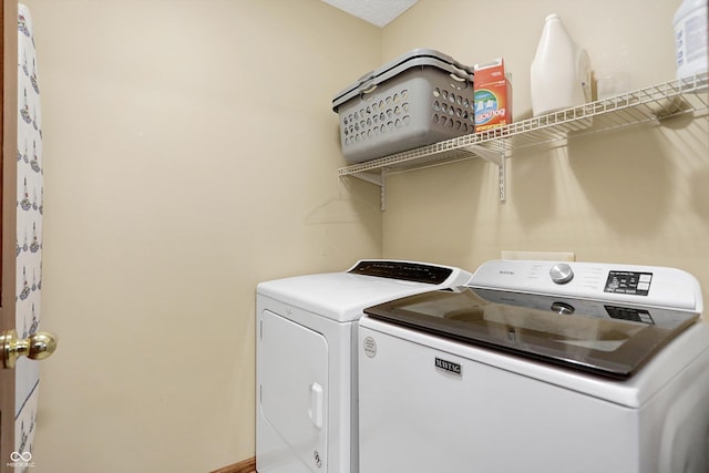 laundry area featuring washer and clothes dryer