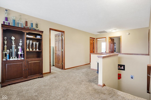 interior space with a textured ceiling