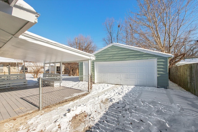 view of snow covered garage