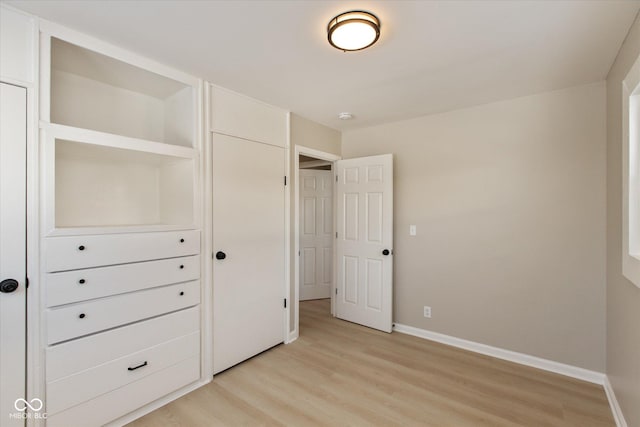 unfurnished bedroom featuring light hardwood / wood-style floors