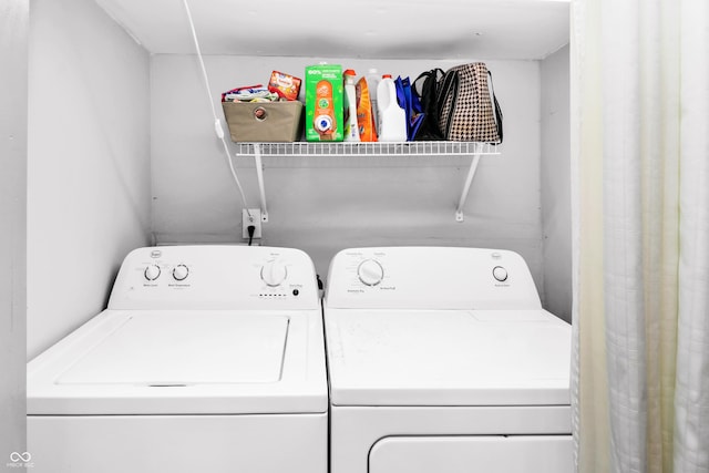 washroom featuring separate washer and dryer