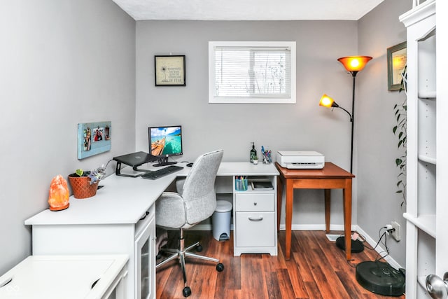 office with dark hardwood / wood-style floors