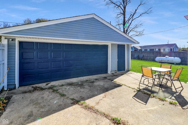 garage featuring a yard