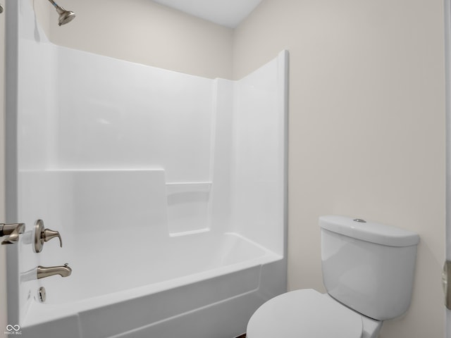 bathroom featuring toilet and shower / bath combination