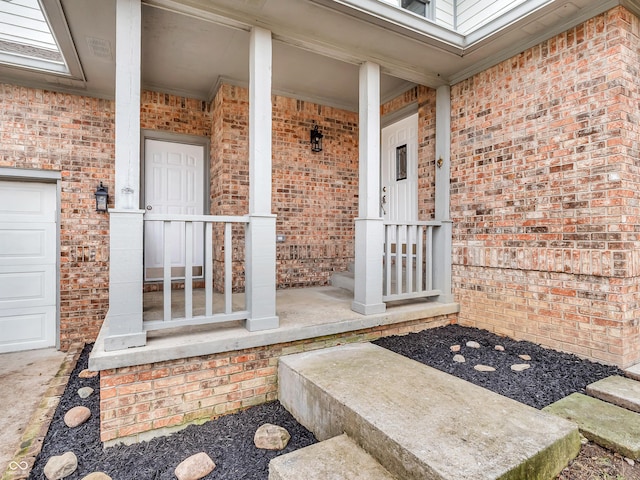 entrance to property featuring a garage