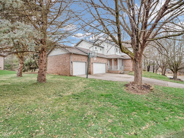 view of front of house with a garage and a front lawn