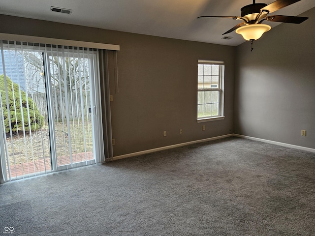 carpeted empty room with ceiling fan