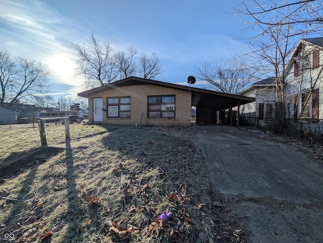 exterior space with a carport