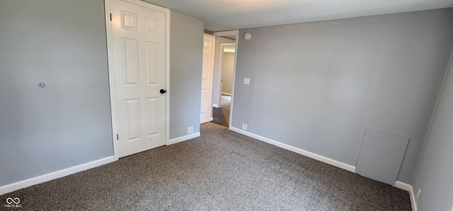 unfurnished bedroom with carpet