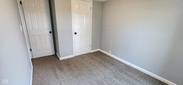 unfurnished bedroom featuring carpet