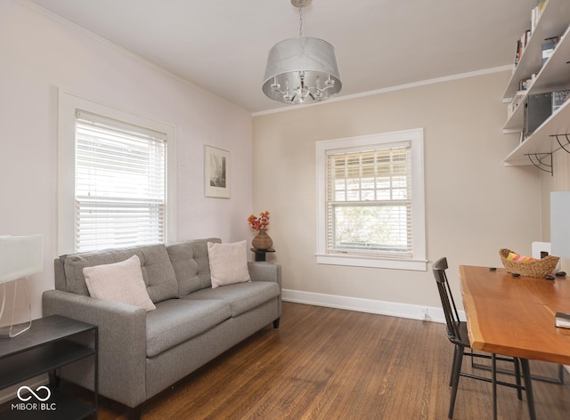 living room featuring a wealth of natural light, dark wood-style floors, and crown molding