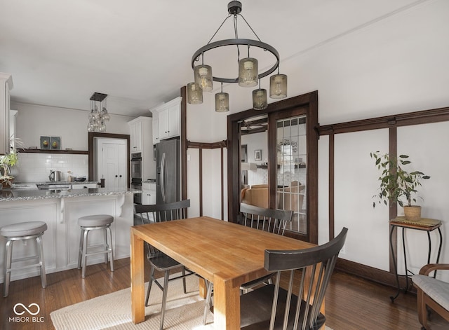 dining area featuring wood finished floors