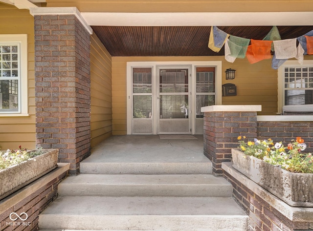 entrance to property with covered porch