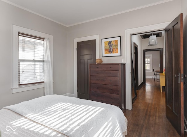 bedroom featuring dark wood-type flooring, multiple windows, crown molding, and baseboards