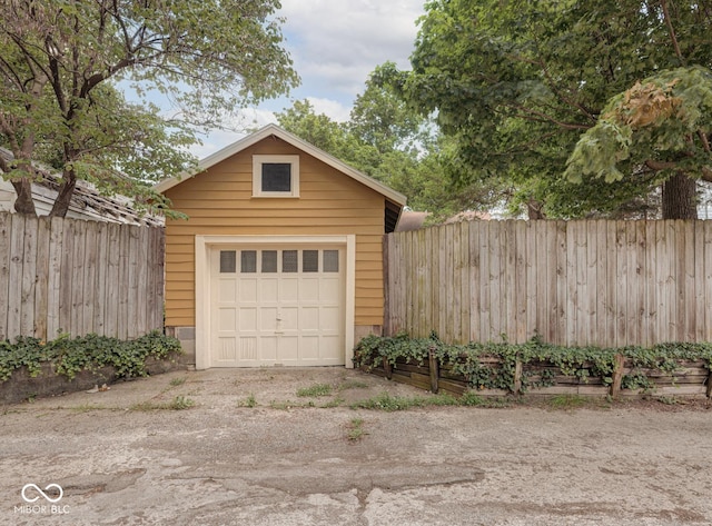 detached garage with fence