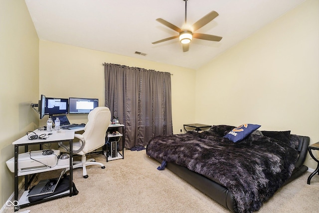 carpeted bedroom featuring lofted ceiling and ceiling fan