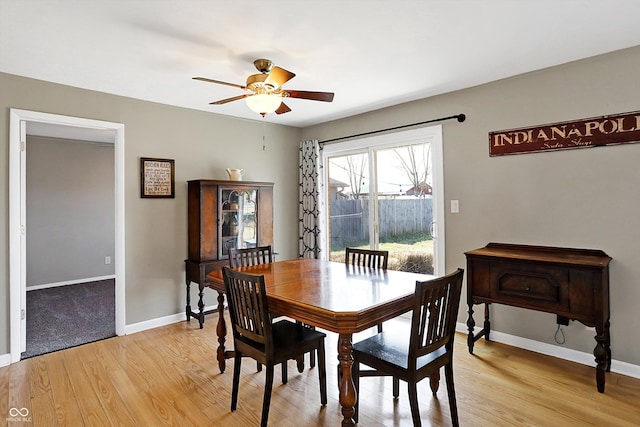 dining room featuring ceiling fan and light wood-type flooring