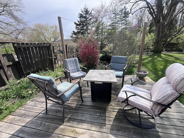 wooden deck with fence and a yard