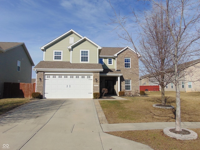 view of front of home featuring a garage and a front lawn