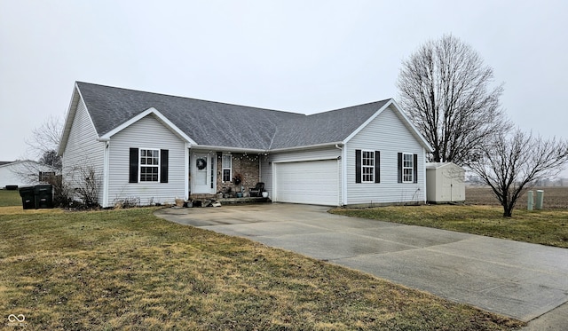 ranch-style house with a garage and a front lawn