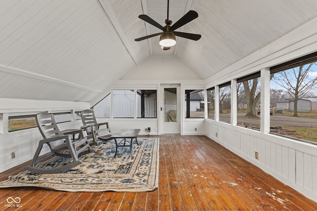 sunroom / solarium with a wealth of natural light, vaulted ceiling, and ceiling fan