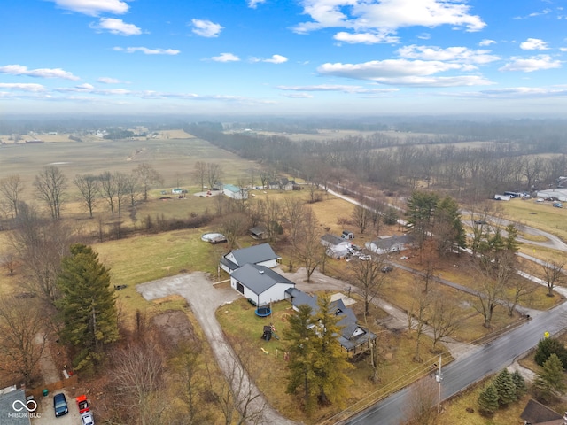 birds eye view of property with a rural view