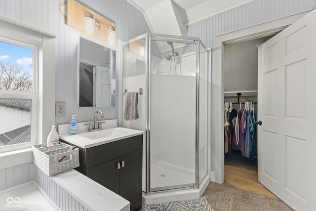 bathroom with vanity and an enclosed shower
